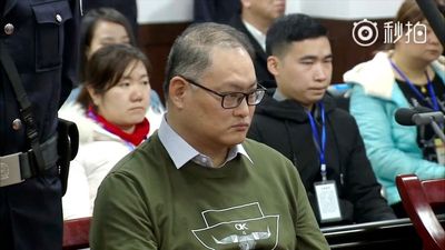 Activist who was imprisoned in China returns to Taiwan