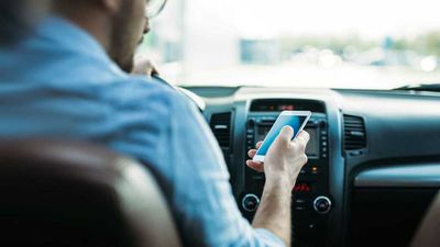 French Survey Reveals 80 Percent Of Drivers Use Phones While Driving