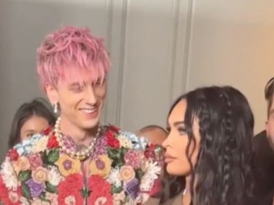 New video shows Megan Fox awkwardly shunning kiss from Machine Gun Kelly on red carpet