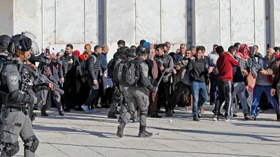 Over 150 Palestinians injured as Israeli police raid Jerusalem's al-Aqsa Mosque compound