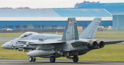 Crowds watch six Canadian F-18 fighter jets land in Scotland after NATO exercise