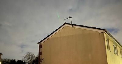 'Strange green light' captured streaking through sky above homes