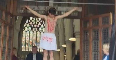 Bizarre video shows man playing Jesus on a cross in Dublin on Good Friday