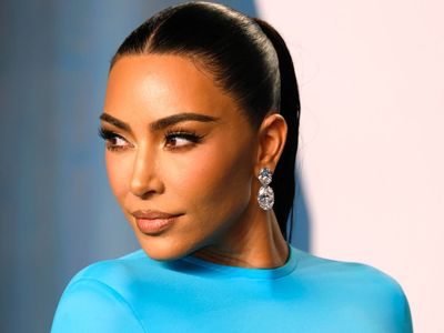 Kim Kardashian jokes she switched to white cheddar cheetos in minimalist kitchen as she shows off pantry