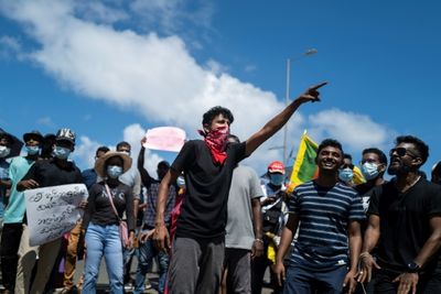 Crisis-hit Sri Lanka halts share trading as protests spiral