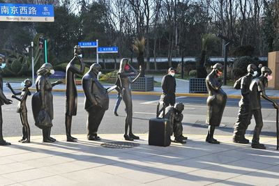 Weekly Must-Read: China Slashes Quarantines for Travelers in Covid Control Trial