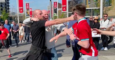 Liverpool and Man City fans filmed fighting on Wembley Way in shocking video