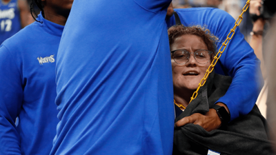 Grizzlies’ Game Stops After Fan Chains Self to Basket