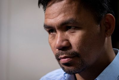 Four Philippine presidential candidates, including Pacquiao, won't quit race