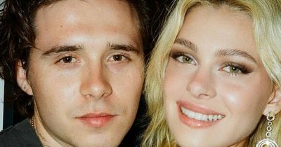 Brooklyn Beckham and Nicola Peltz snog at family dinner after posting topless photo