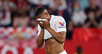 Anthony Martial booked after being fouled for Sevilla vs Real Madrid and then goes off injured