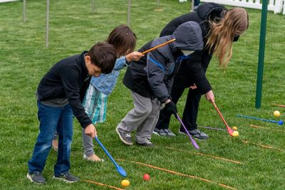 Rain dampens the 1st White House Easter Egg Roll since 2019