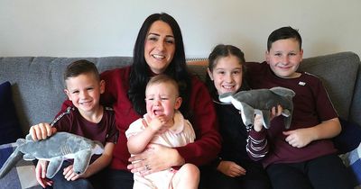 Lanarkshire woman faces her fears by swimming with sharks in memory of son