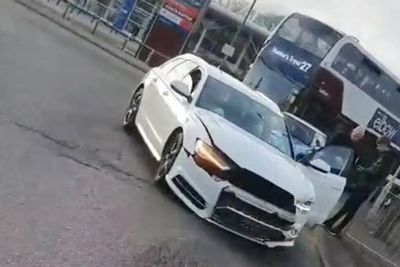 Edinburgh police scrambled as taxi smashes through roadside barrier outside Tesco