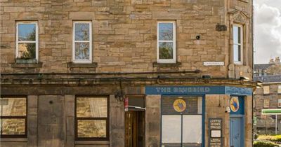 Poky Edinburgh flat with 'bed on shelf' hits market with hefty price tag