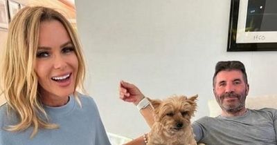 Amanda Holden looks chic as she poses with Simon Cowell in their PJs - but fans don't recognise him