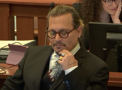 Johnny Depp laughs in court when nurse questioned over explicit note about his penis