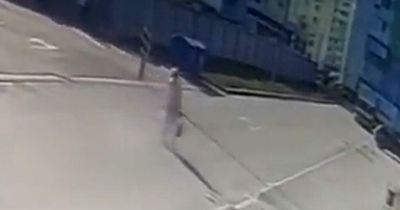 Chilling moment Russian airstrike misses Ukrainian woman by inches in latest bombardment