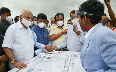 Former Karnataka CM B S Yediyurappa inspects airport construction in Shivamogga