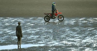 Scrambler biker filmed in 'Mexican standoff' with police on Crosby beach