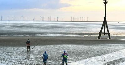 Three men arrested after scrambler bike causes hours of chaos on Crosby beach
