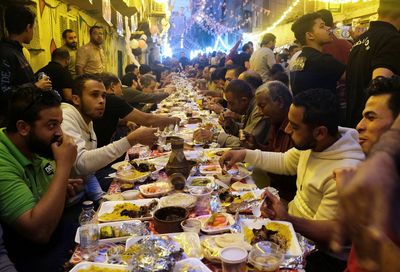 Cairo's Ramadan street feasts return after coronavirus suspension
