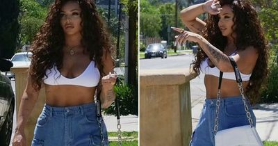 Jesy Nelson shows off toned abs in a white crop top and jeans as she leaves LA studio