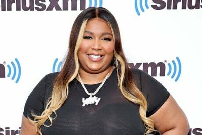 Lizzo confirms mystery man she was photographed holding hands with is her boyfriend