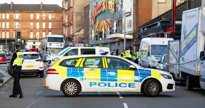Man rushed to hospital with 'head injury' as police lock down road in Glasgow's east end