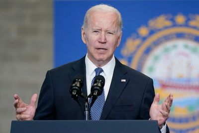 Moving beyond masks: Biden toils to put pandemic behind him