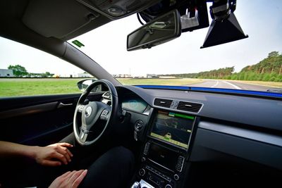 Motorists in self-driving cars can watch TV and films behind wheel in Highway Code change