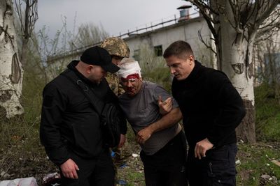 Russia hits Ukrainian cities, pours more troops into war