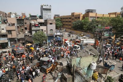 India's top court halts demolition of shops in area near New Delhi clashes