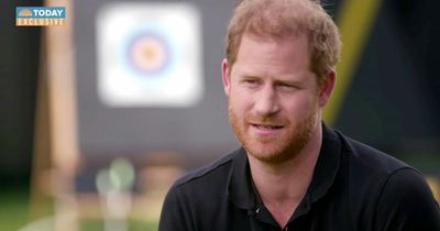 Prince Harry says he's settled into the millionaire celebrity community in dig at UK