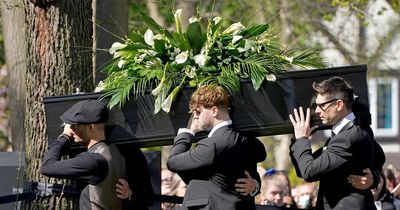 The Wanted bandmates carry Tom Parker's coffin as fans line the streets for star's funeral