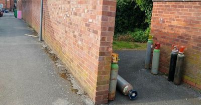 Woman blasts gas cylinders left in Nottingham alleyway as 'safety hazard'