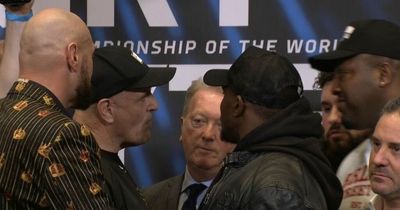 Tyson Fury stops "idiot" dad John starting brawl during Dillian Whyte face-off