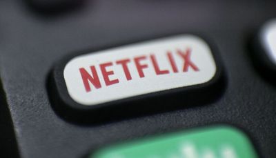 Netflix looks to curb password sharing, considers ads