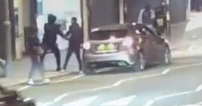 New dramatic Amir Khan CCTV footage shows robber wielding gun in boxer's face