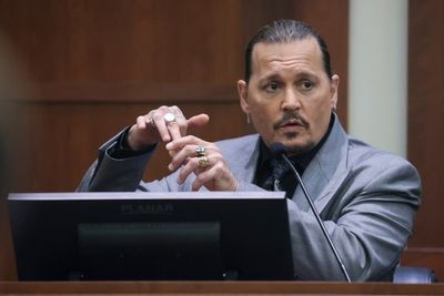 Johnny Depp cringes as he describes seeing photo of faeces on his bed days after fight with Amber Heard