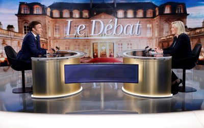 Macron cements French presidential frontrunner status with combative debate performance