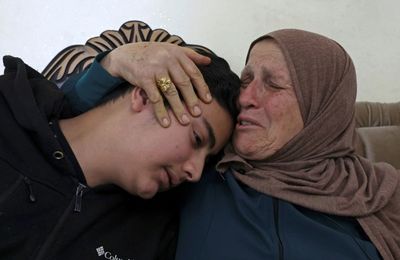 Orphaned Palestinians mourn unarmed mother shot by Israeli soldier