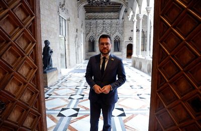 Catalan leader says to freeze parliamentary support to Spanish PM over spying row