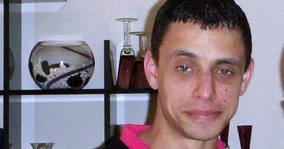 Scots thug threatened to slit female cop's throat and bury her after being found with knives