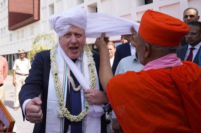 In Pictures: PM tries ‘art of spinning’ and clambers aboard JCB on Indian visit