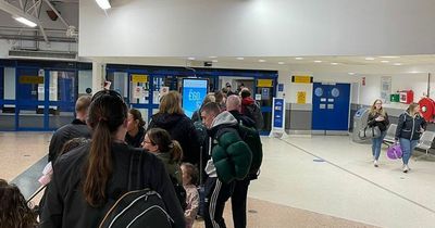 Liverpool-bound passengers race to gate after huge queues at Belfast Airport