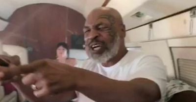 Boxing legend Mike Tyson 'beats up passenger' on flight 'to leave him bloodied'