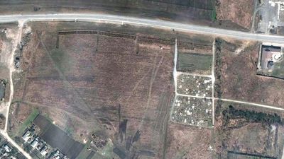 Satellite images show mass grave site in Ukrainian town near Mariupol
