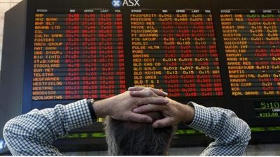 ASX drops, Wall Street stocks fall on Fed chair Jerome Powell's rate hike warning