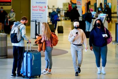 Boston urges masks as battle brews over transit rule